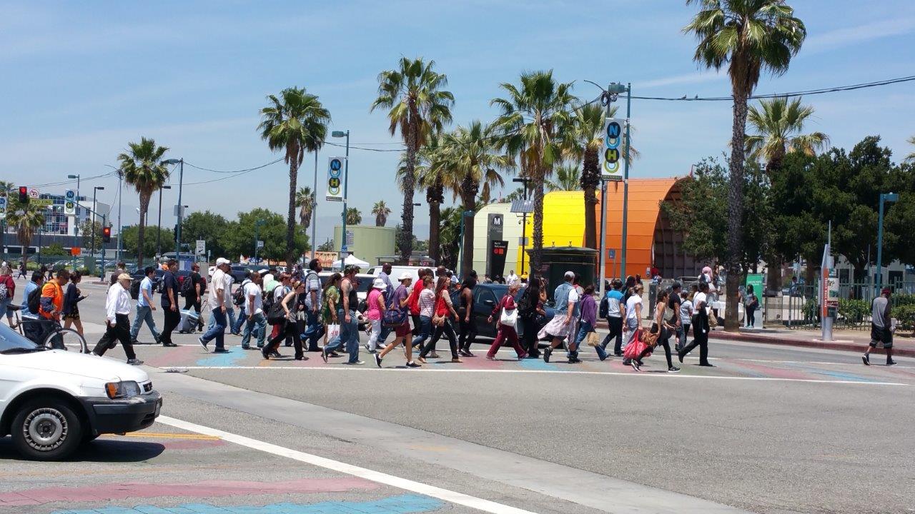 Passengers crossing Lankershim Boulevardprior to North Hollywood West Entrance Opening